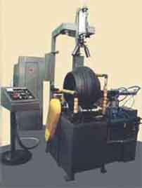 Machines for lubricant coating of green tires